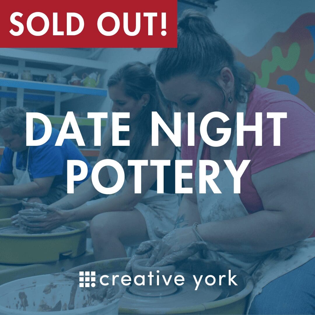 Image of people in a date night pottery class
